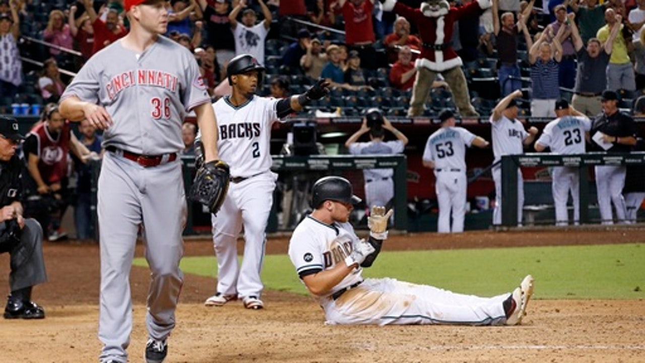 Diamondbacks beat Reds on 2-out wild pitch in 11th